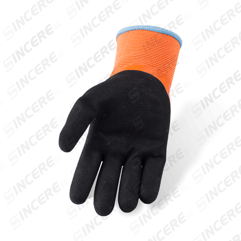 Guantes de látex naranja totalmente recubiertos de poliéster calibre 13 con refuerzo de pulgar arenoso negro y forro polar térmico