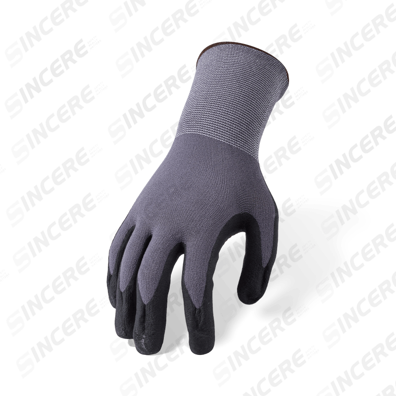 Guantes de spandex de nailon calibre 15 con palma de microespuma de nitrilo negro y agarre antideslizante con puntos de PVC naranja